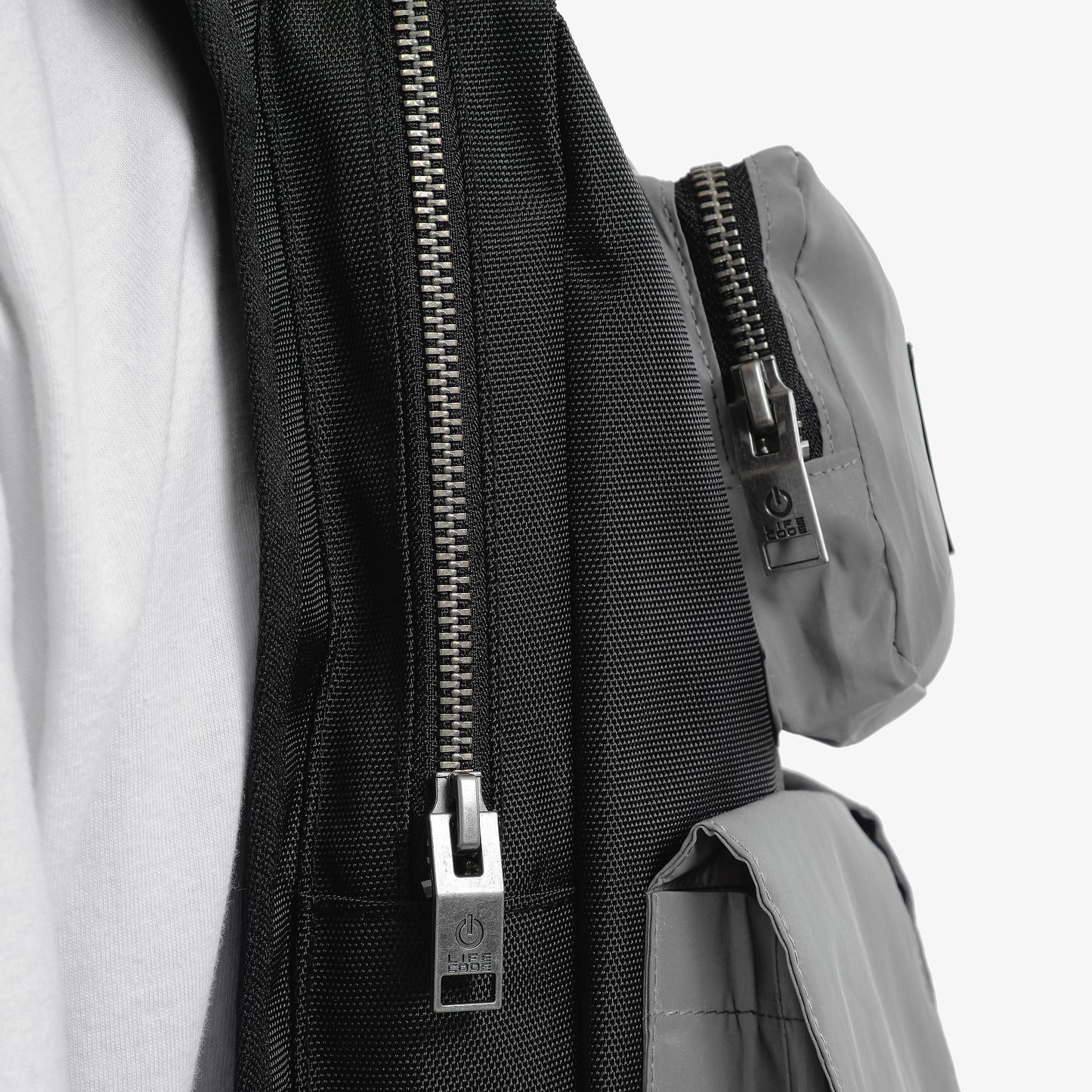 V19. SILVER REFLECTIVE BACKPACK VEST W/ HOOD