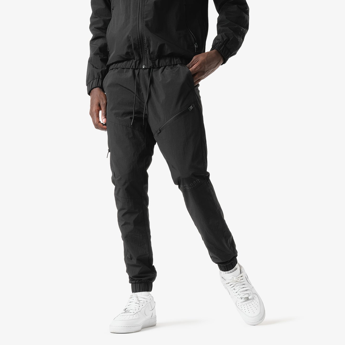 P81. BLACK WINDBREAKER PANTS