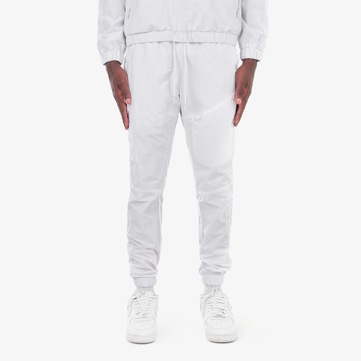 P81. WHITE WINDBREAKER PANTS