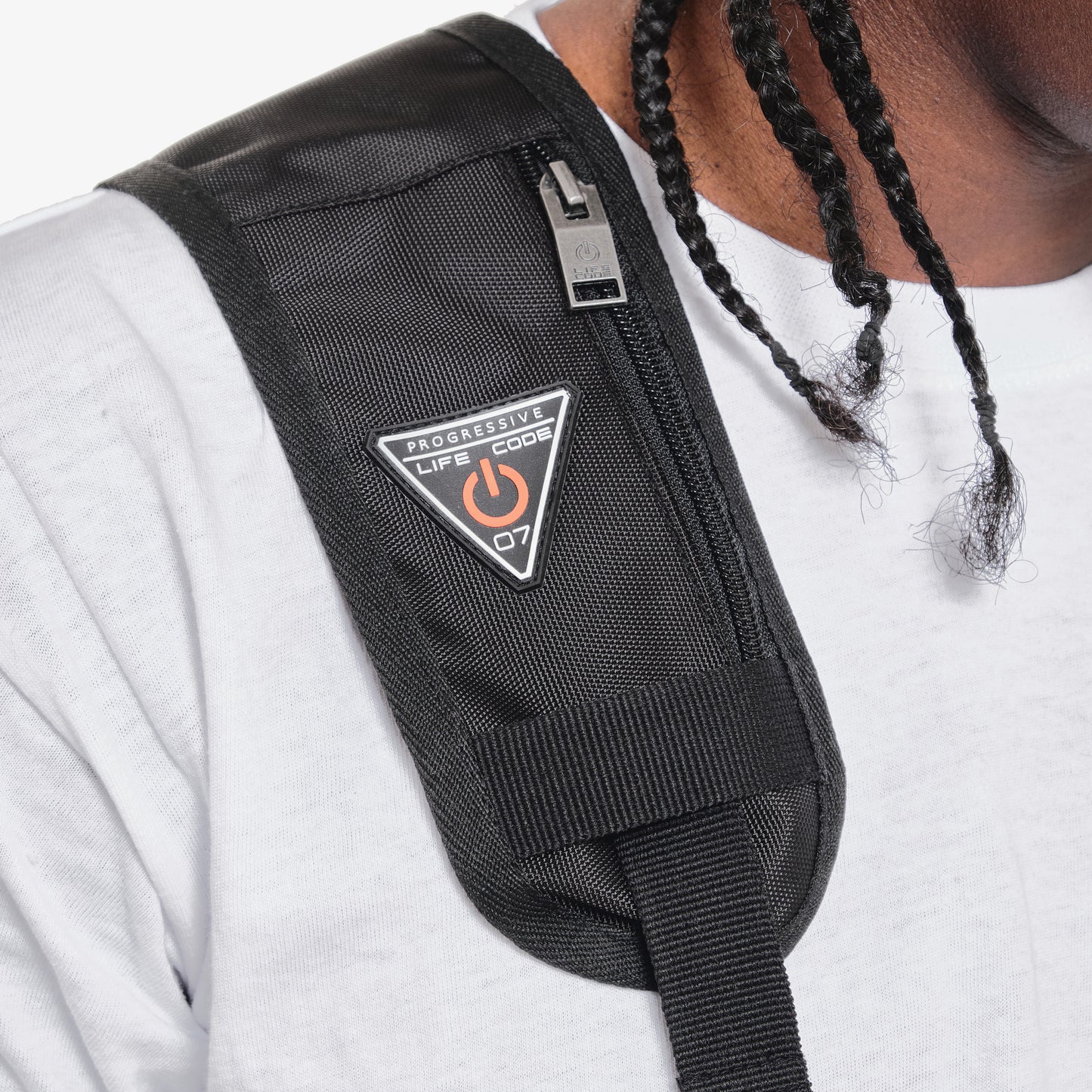 V12. BLACK / SILVER REFLECTIVE UTILITY VEST (BACKPACK)
