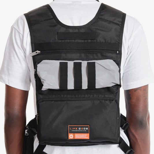 V12. BLACK / SILVER REFLECTIVE UTILITY VEST (BACKPACK)