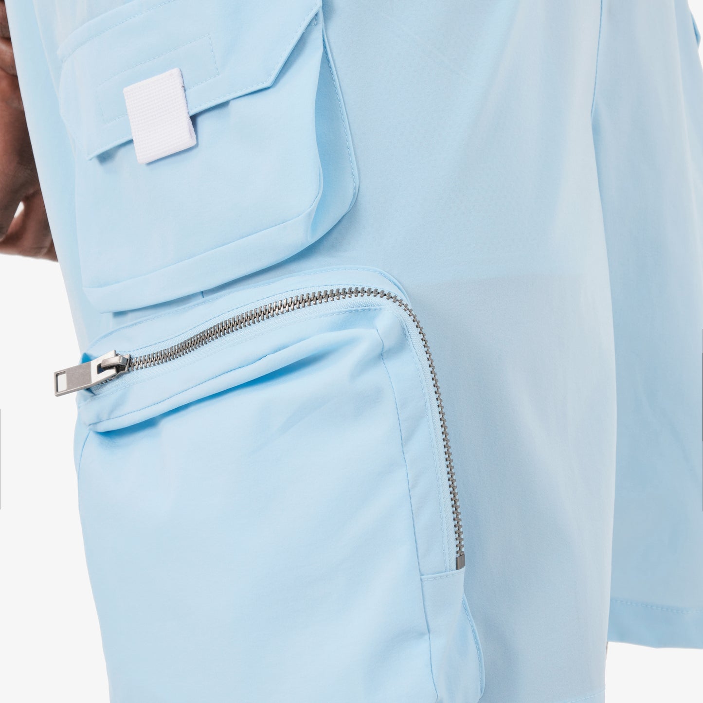 P68. LIGHT BLUE NYLON SHORTS W/ CARGO POCKETS