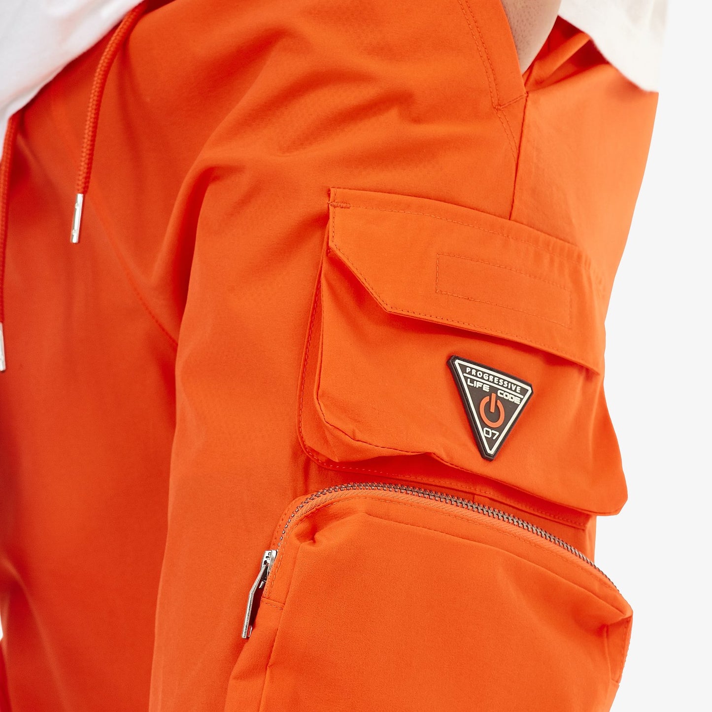 P51. ORANGE NYLON SHORTS W/ CARGO POCKETS