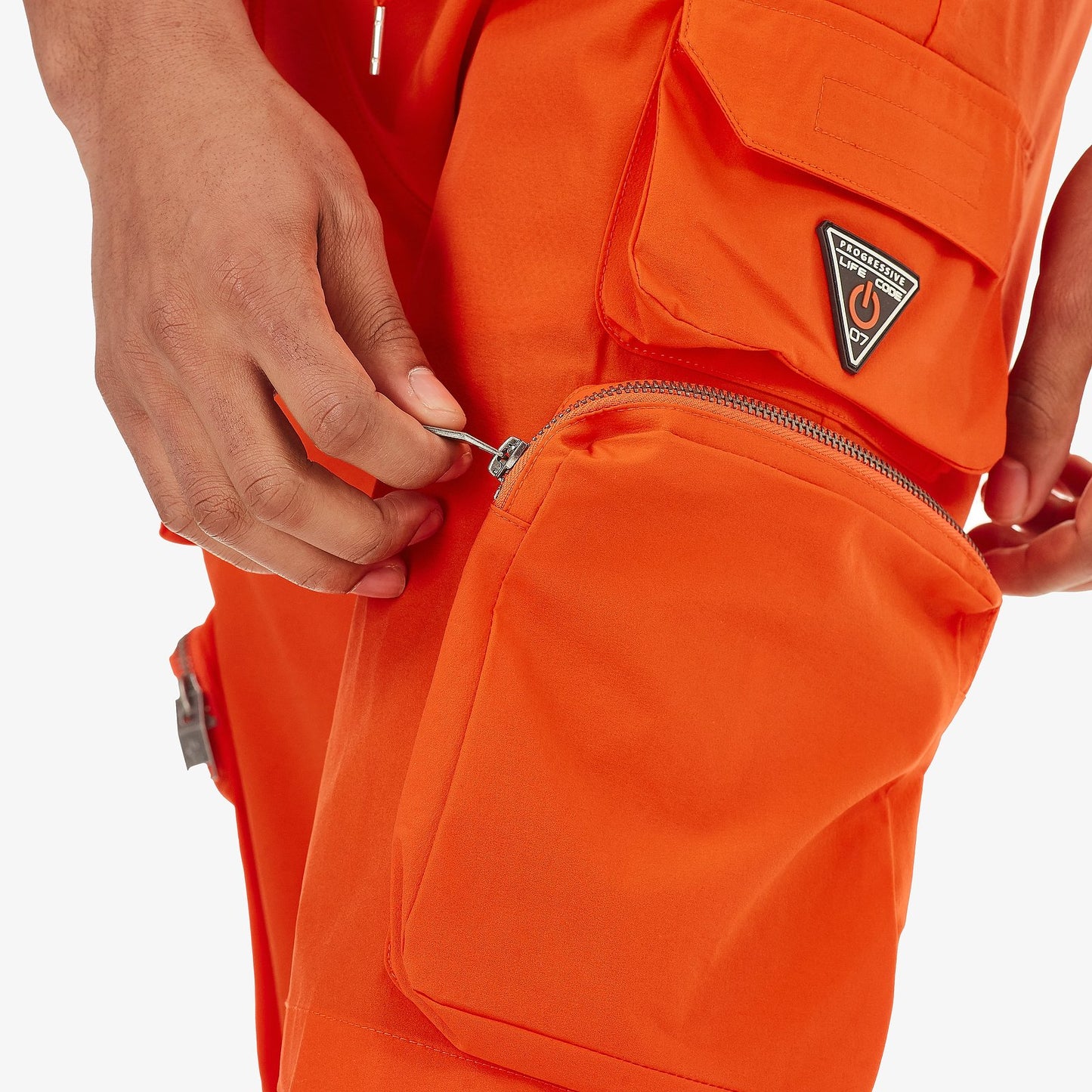 P51. ORANGE NYLON SHORTS W/ CARGO POCKETS